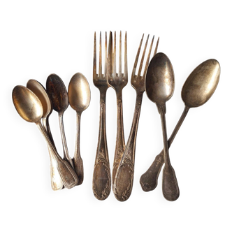 Set of antique vintage cutlery in alloy metal