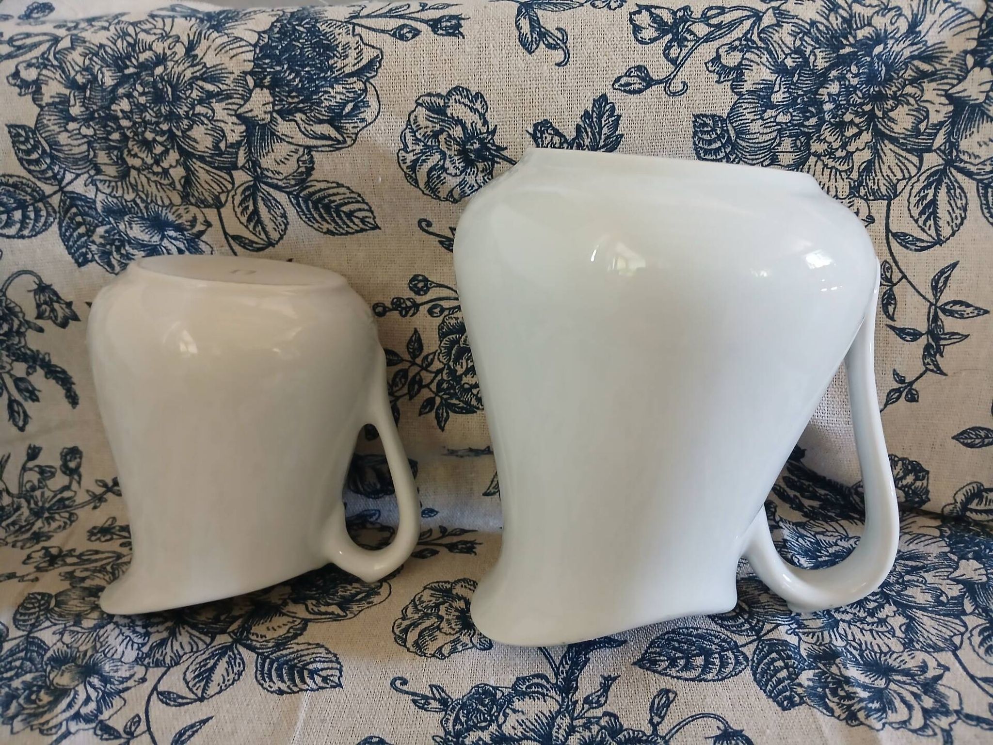 2 small vintage jugs