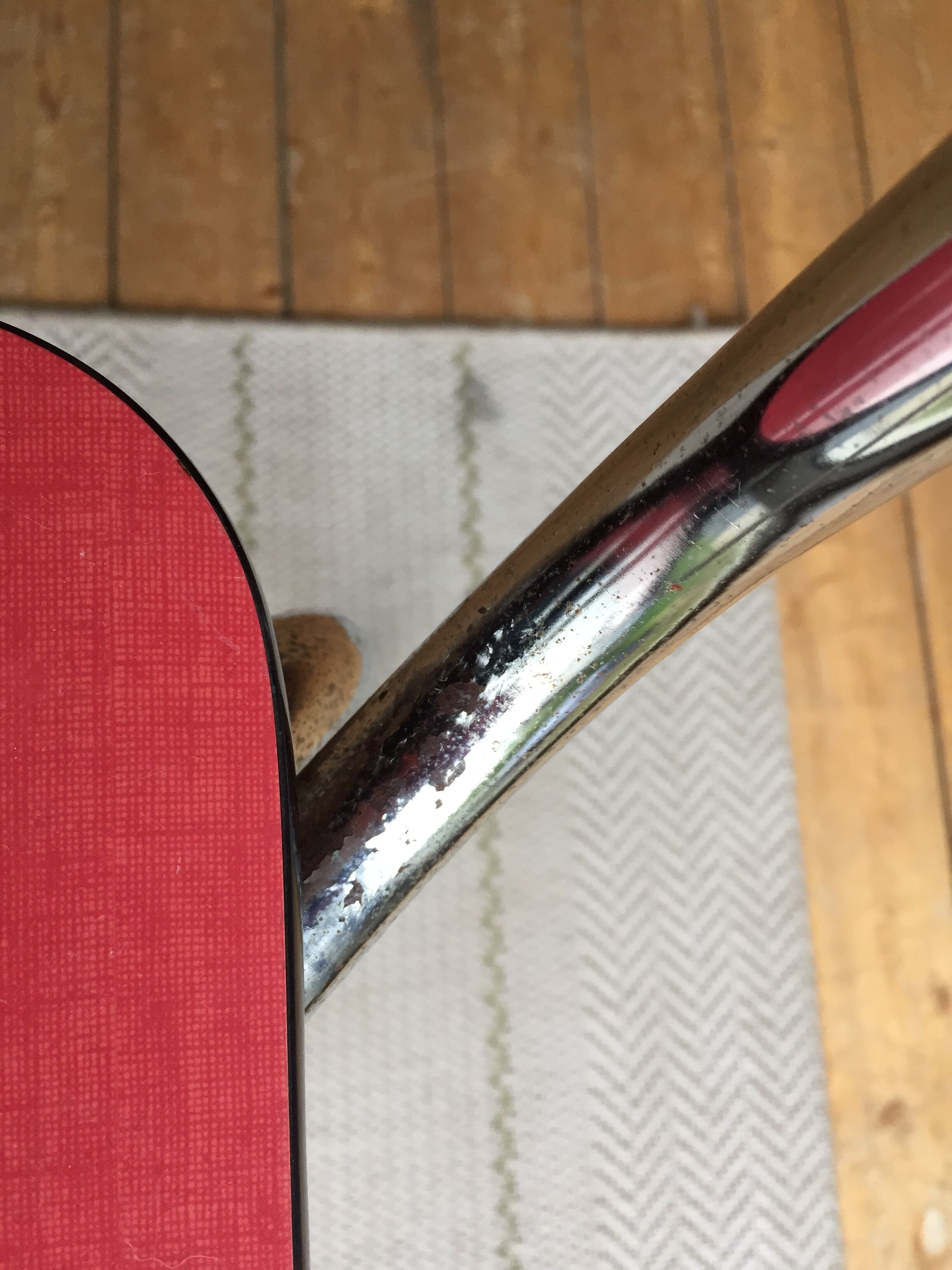 Table set and 2 vintage vintage pale red formica chairs