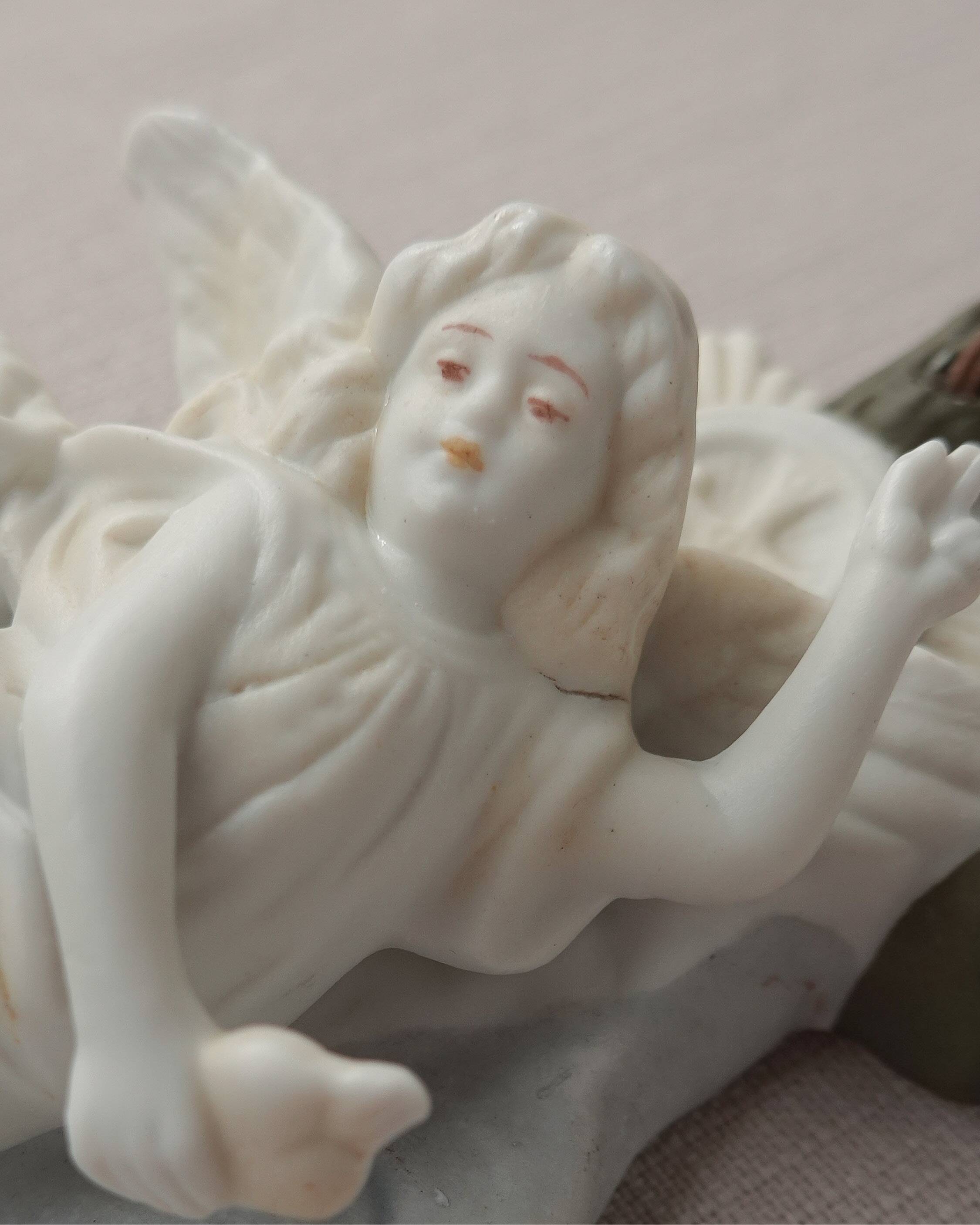 Wall angel holy water font