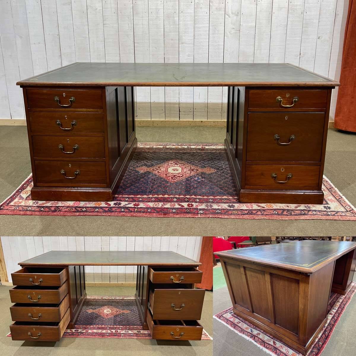 Large English flat desk in mahogany with leather top, early 20th century