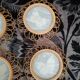 6 coasters in wooden wicker and butterfly background