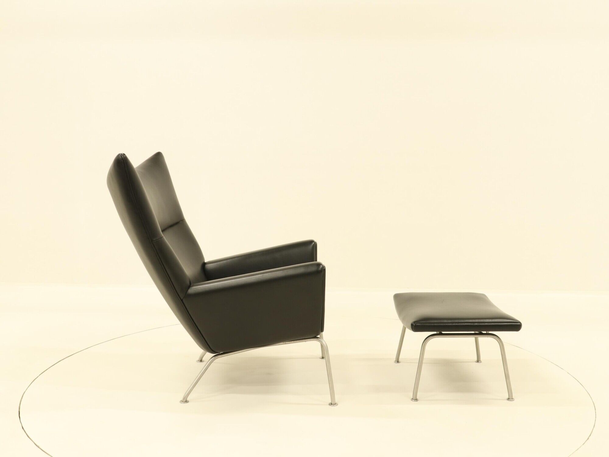 Wing chair & matching ottoman – CH445 & CH446 – by Hans Wegner