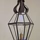 Hexagonal shaped copper and glass hanging lantern