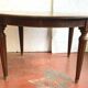 Louis XVI style table in mahogany and light wood 20th century