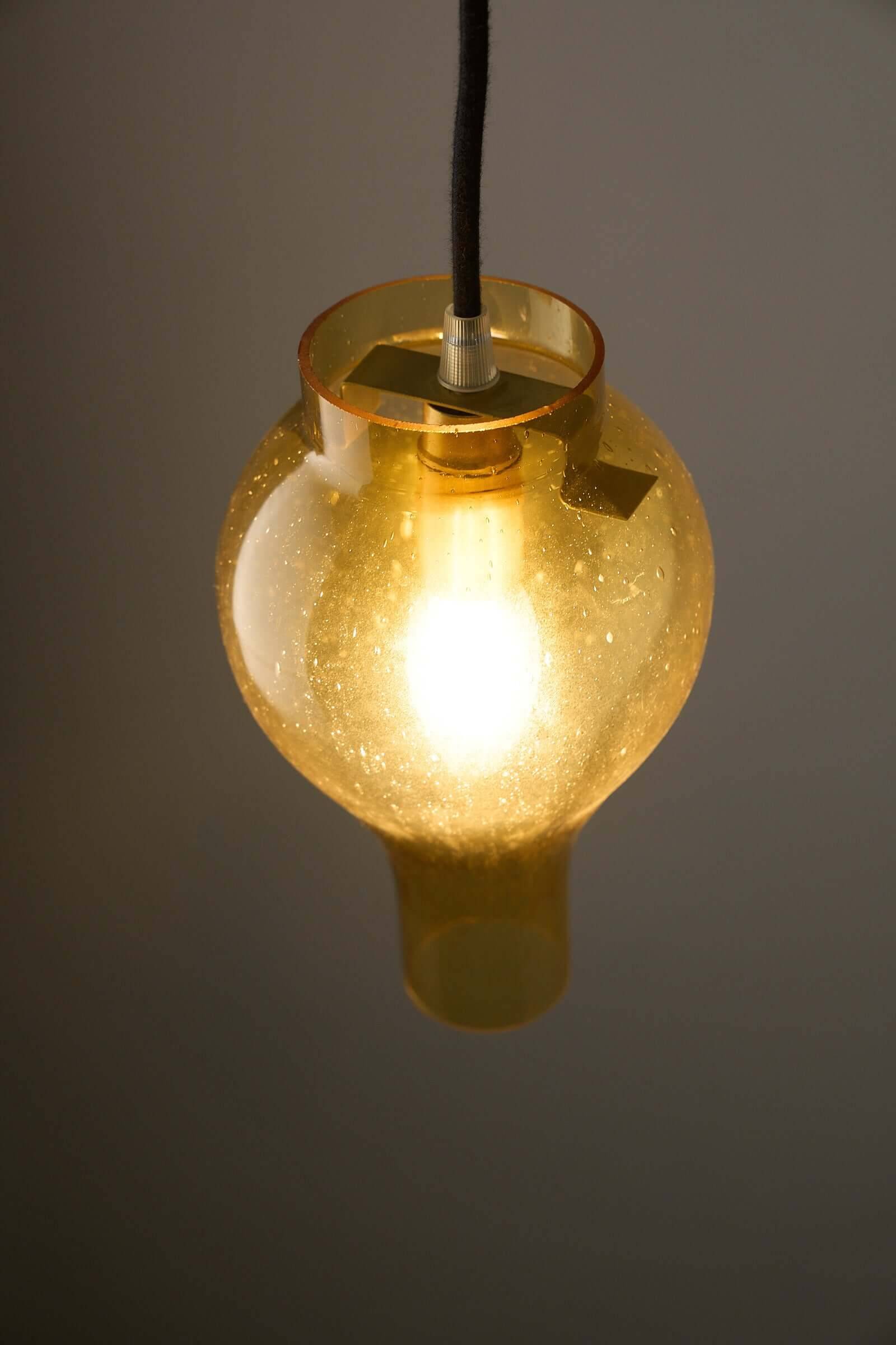 Yellow glass pendant lamp with bubbles