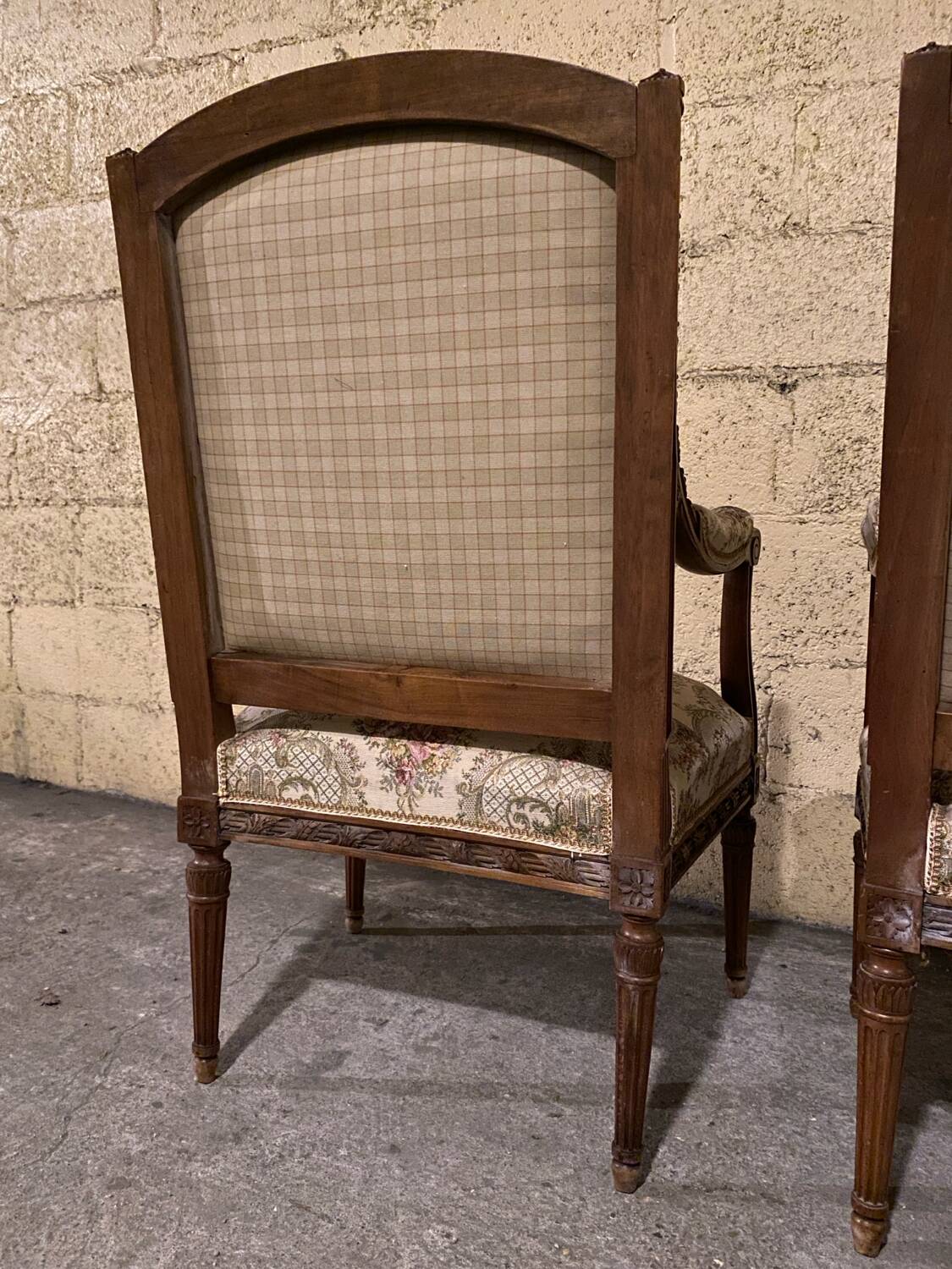 Pair of antique carved wooden armchairs