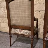 Pair of antique carved wooden armchairs