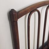 Old curved wooden bed - one person