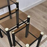 Set of 3 vintage nesting tables in smoked glass and black metal – 1970s