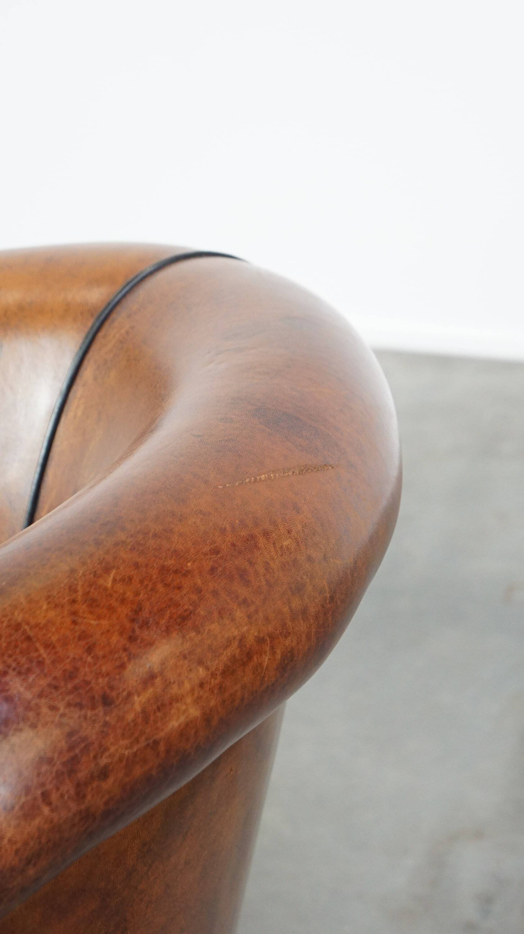 Fauteuil club vintage en cuir de mouton