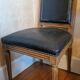 Antique Louis XVI style chair in solid wood and patinated leather.