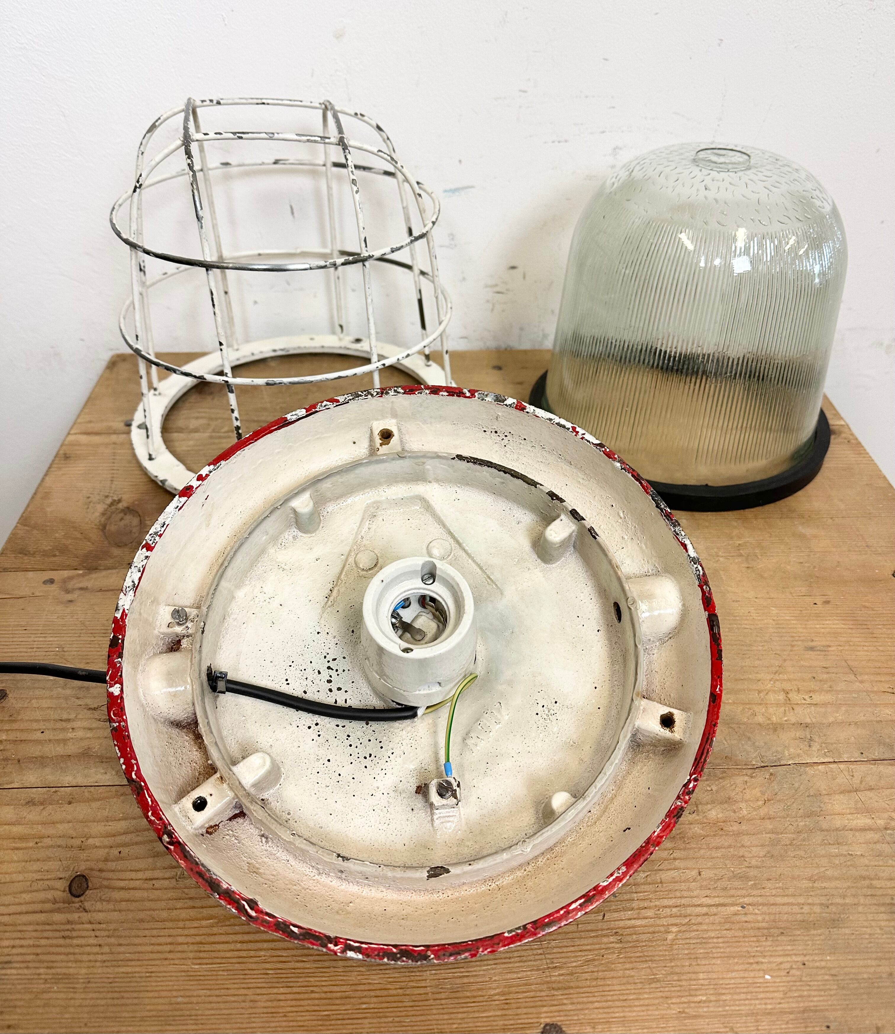 Red industrial cast iron cage pendant light, 1960s