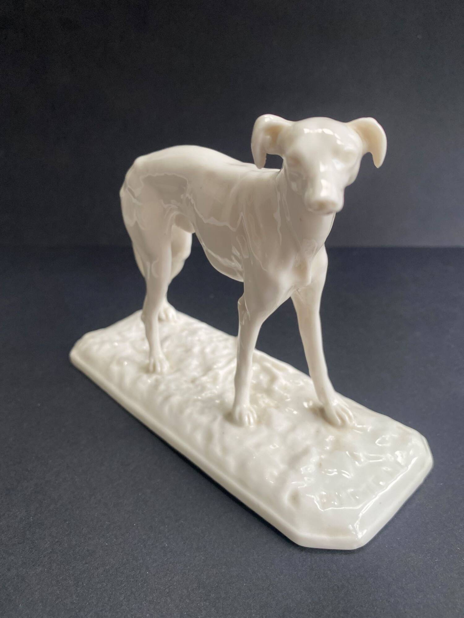 Nymphenburg porcelain greyhound sculpture signed PJ MENE