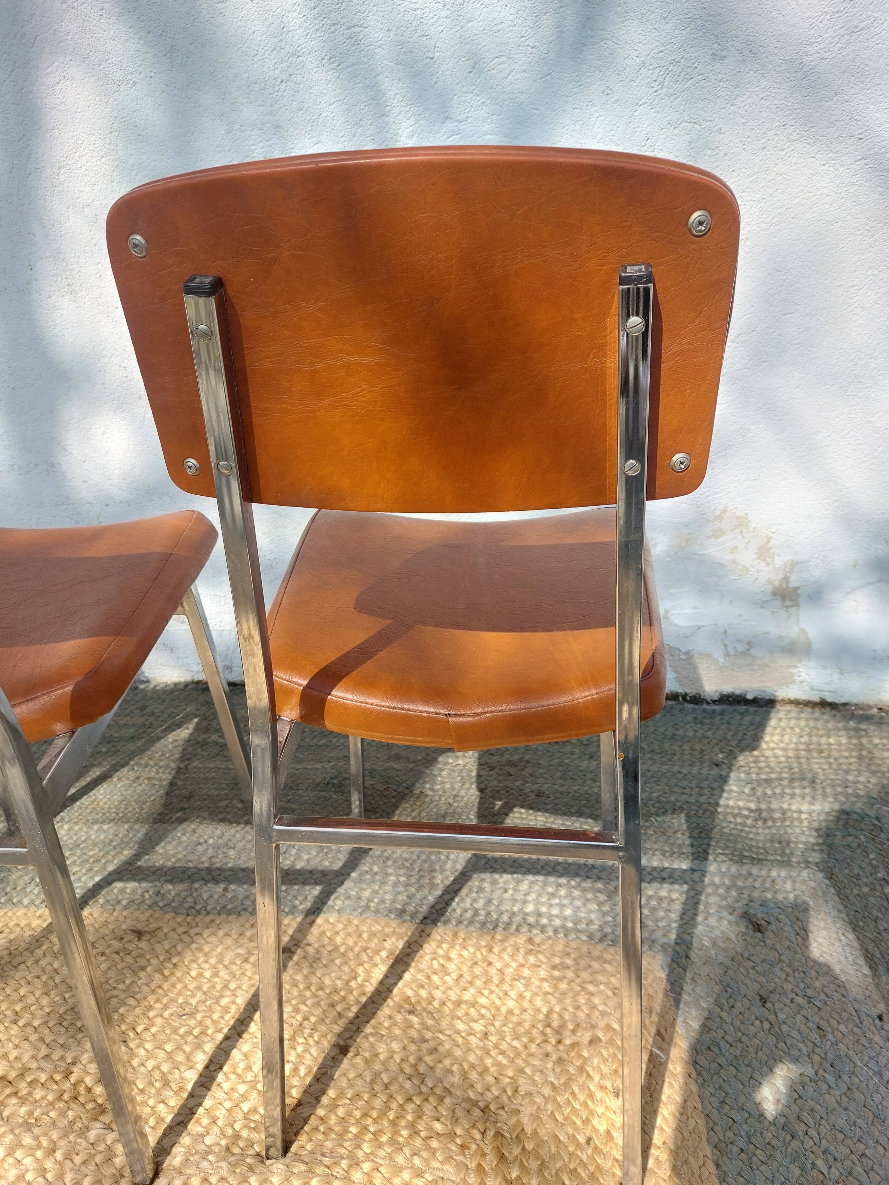 3 stainless steel tube chairs and faux leather, vintage