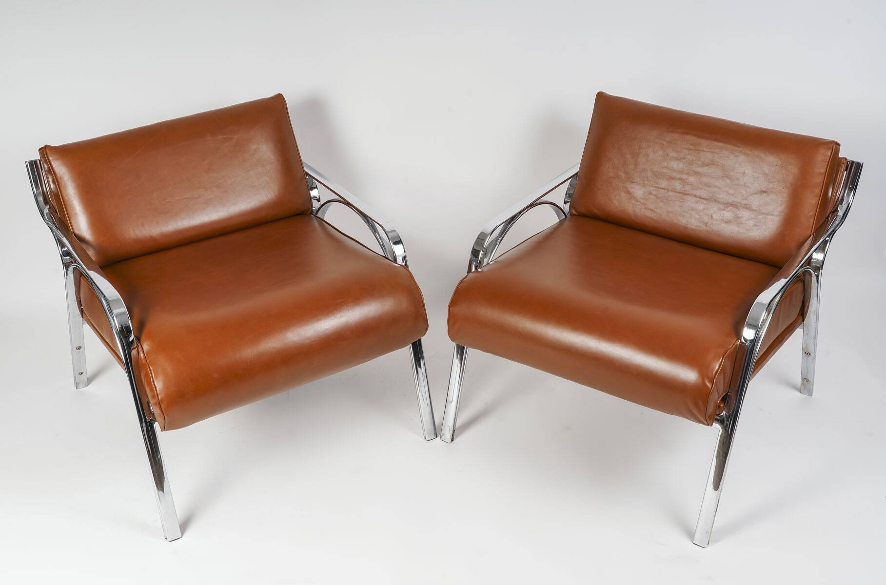 Pair of metal and leather armchairs from the 60s