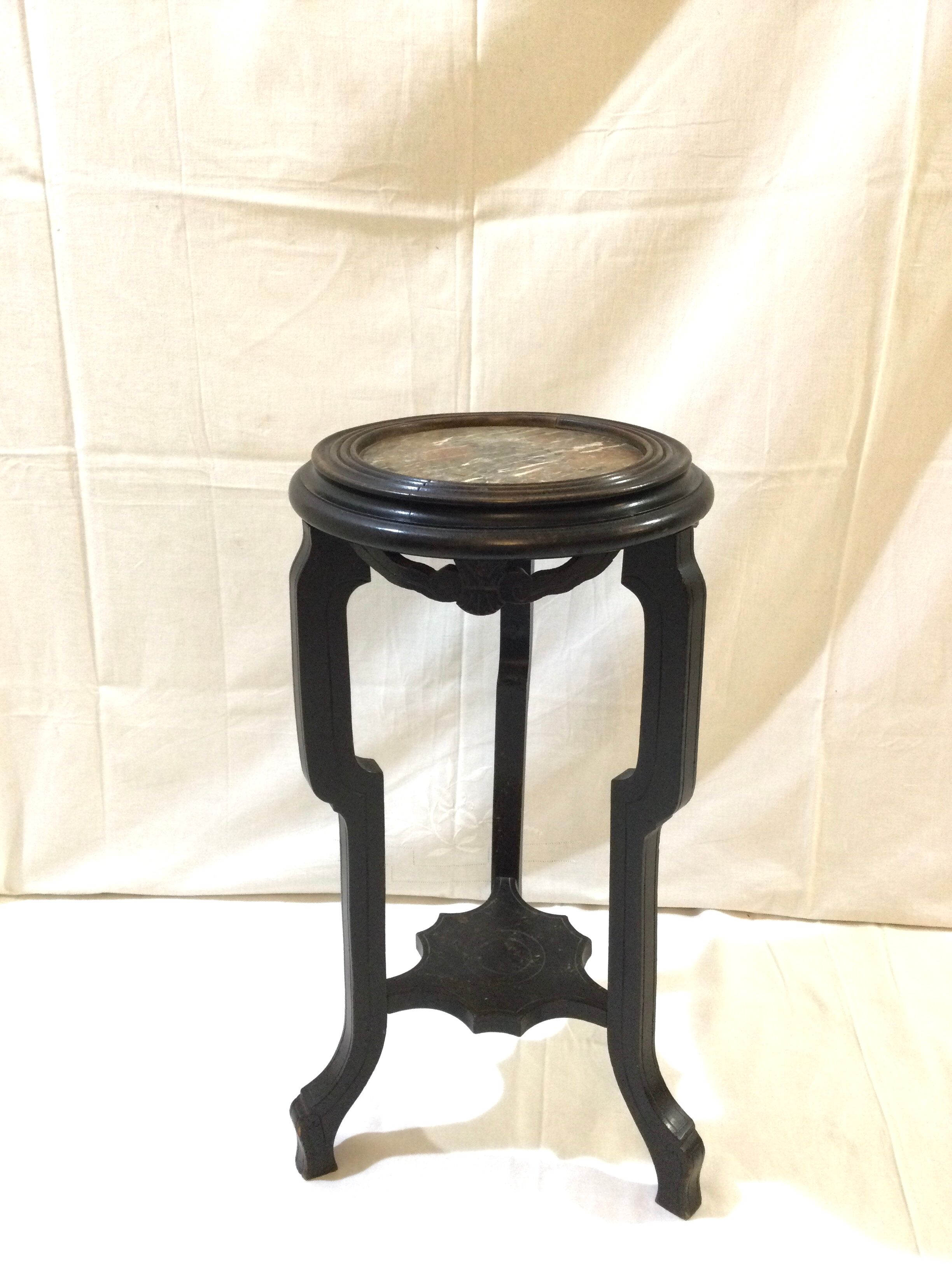 Blackened wooden and marble harness