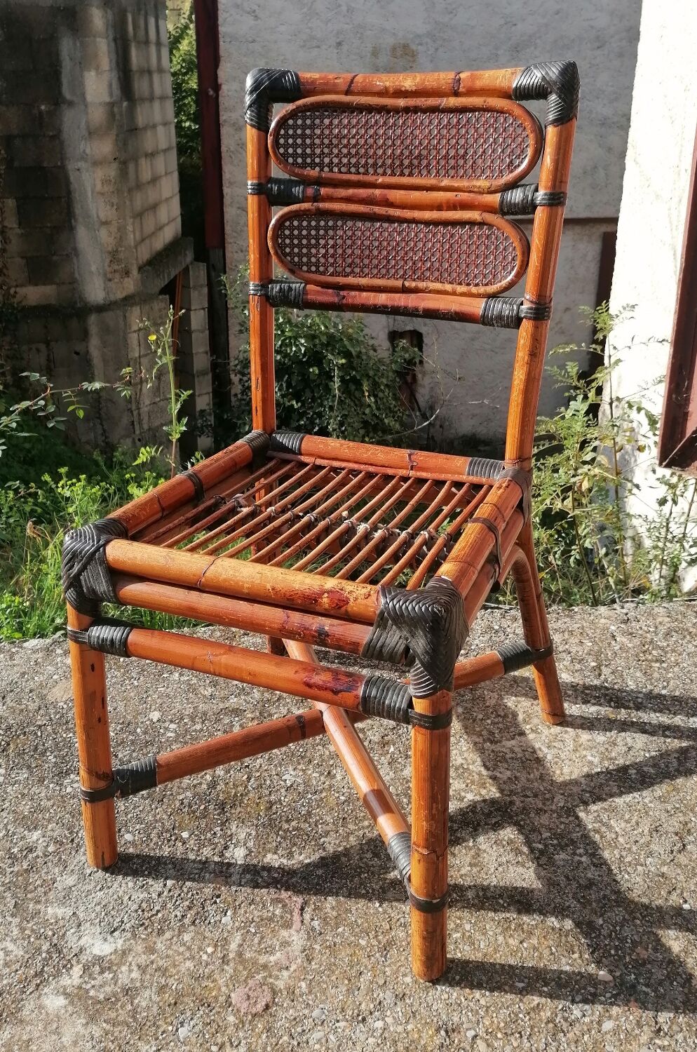 Vintage MacGuire chair in bamboo and canning