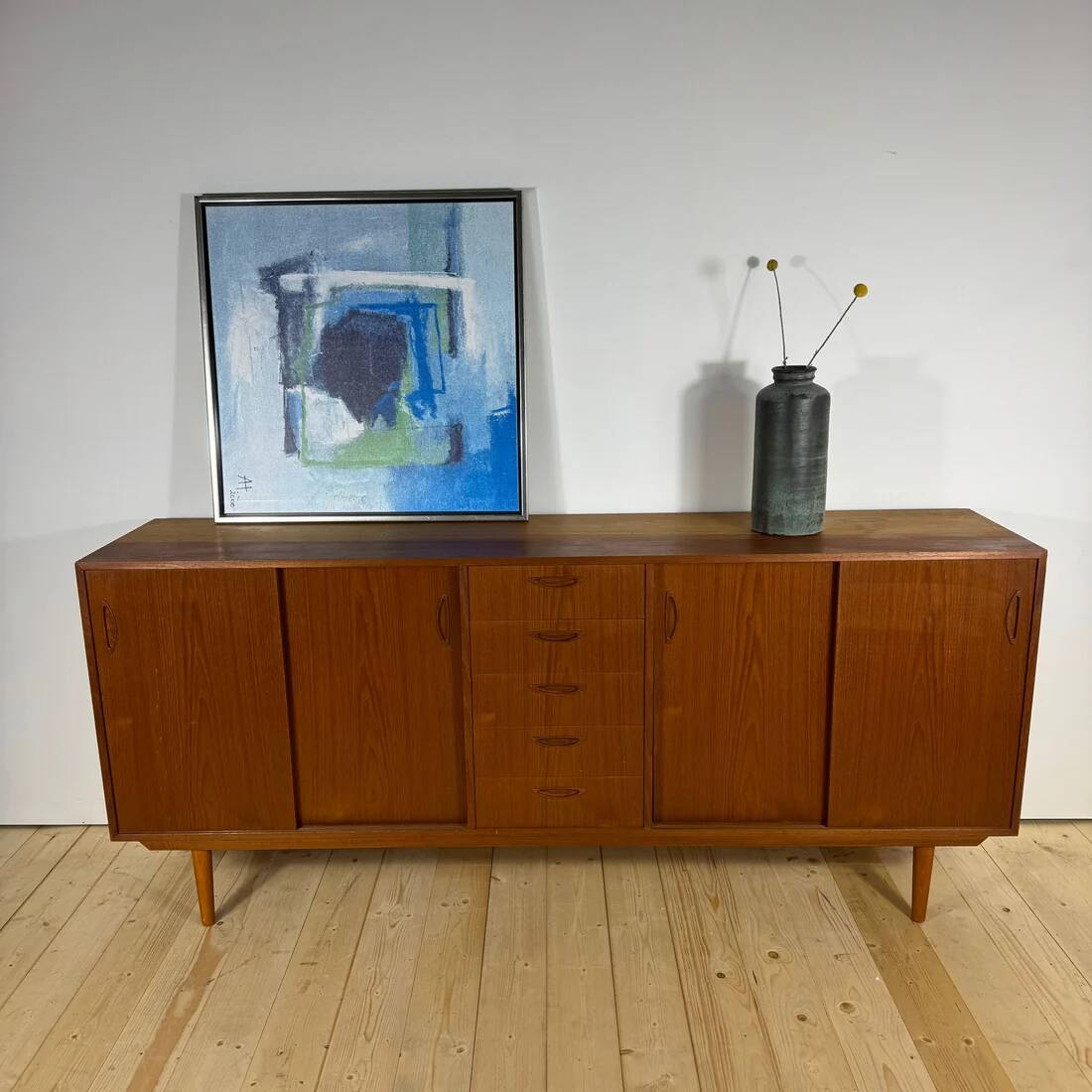 Danish mid-century modern buffet in teak with drawers and sliding doors – 1960s