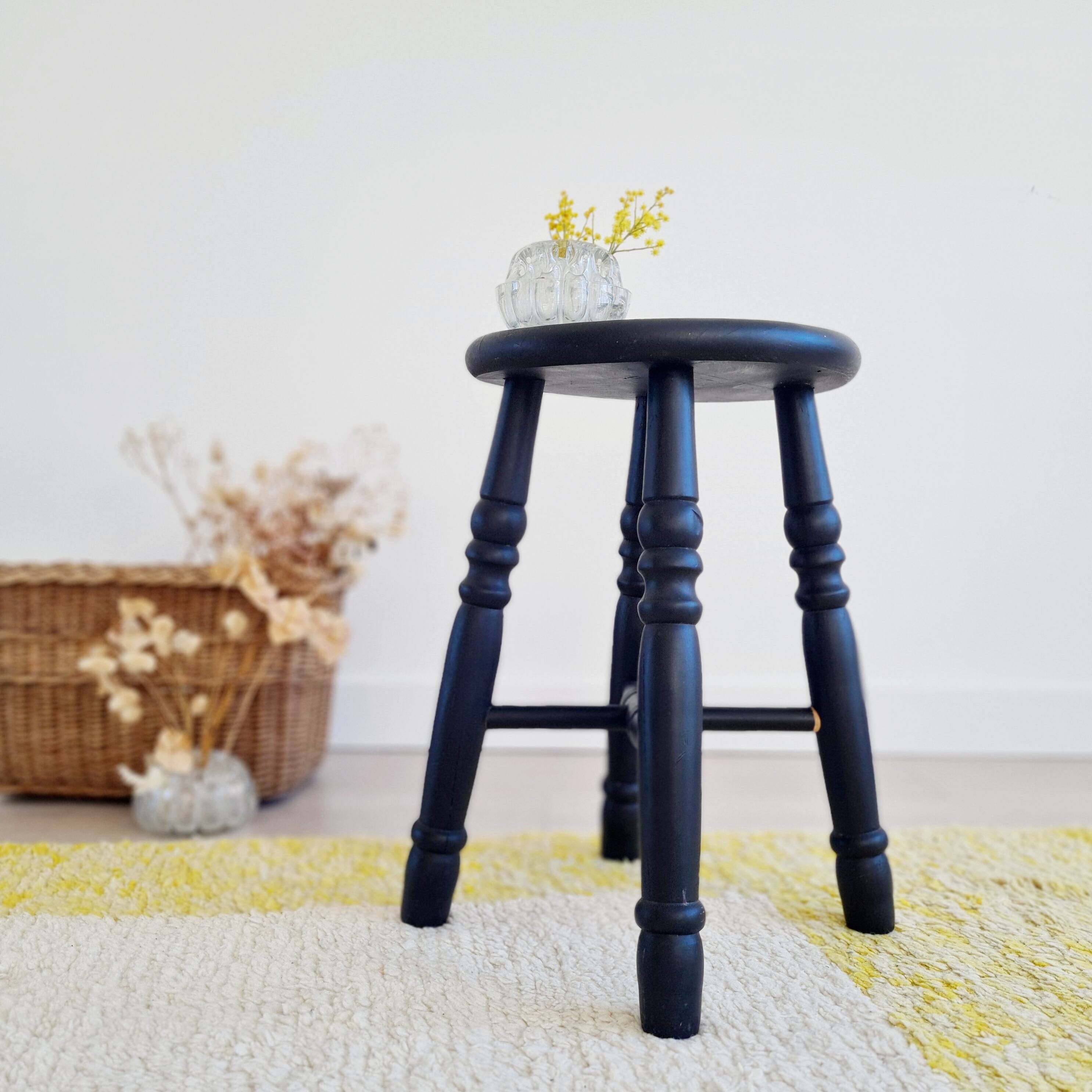 Antique black wooden stool, renovated
