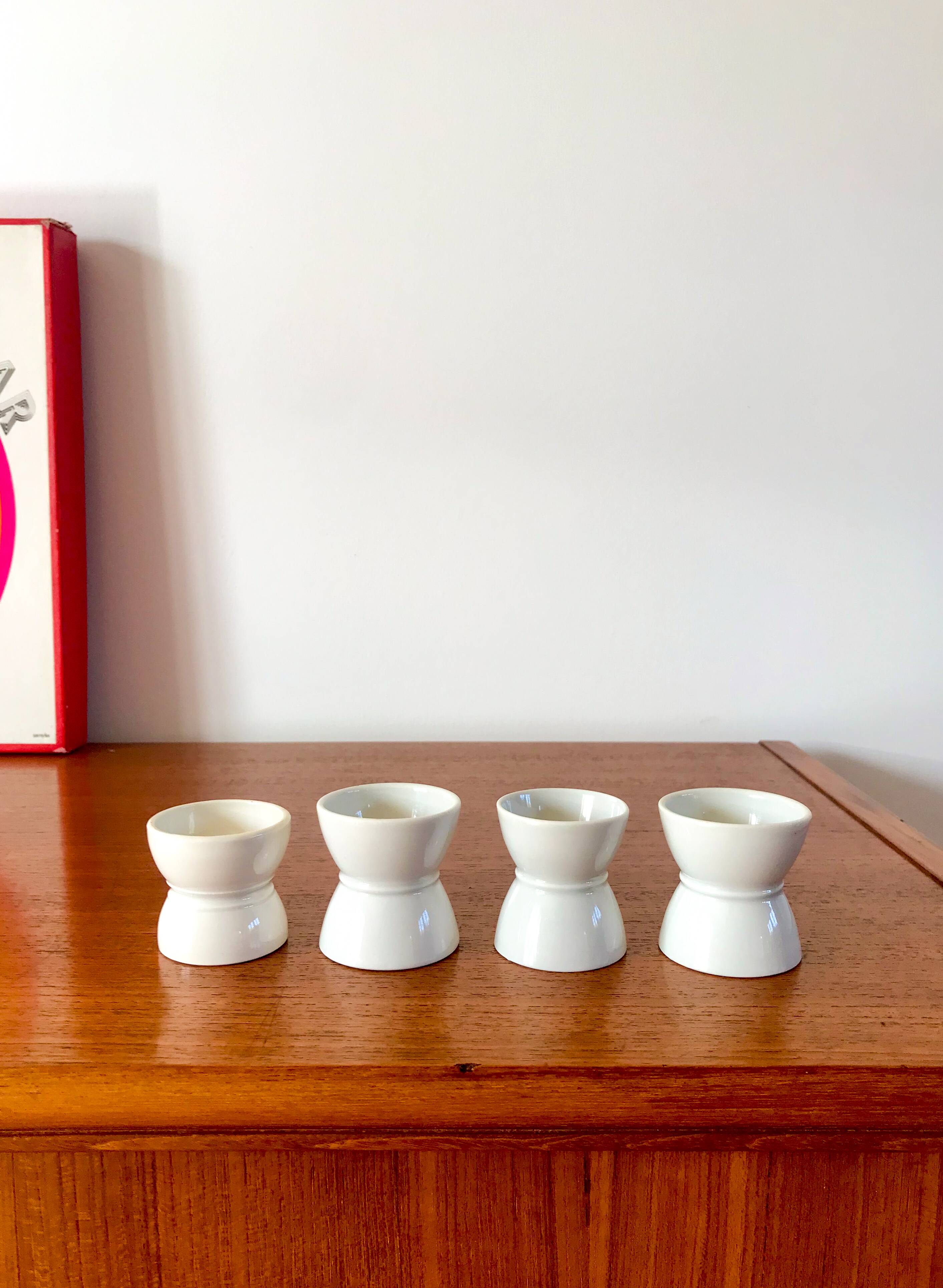 set of 4 earthenware diabolo egg cups early 20th century