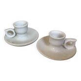 Pair of small white cellar rat candlesticks