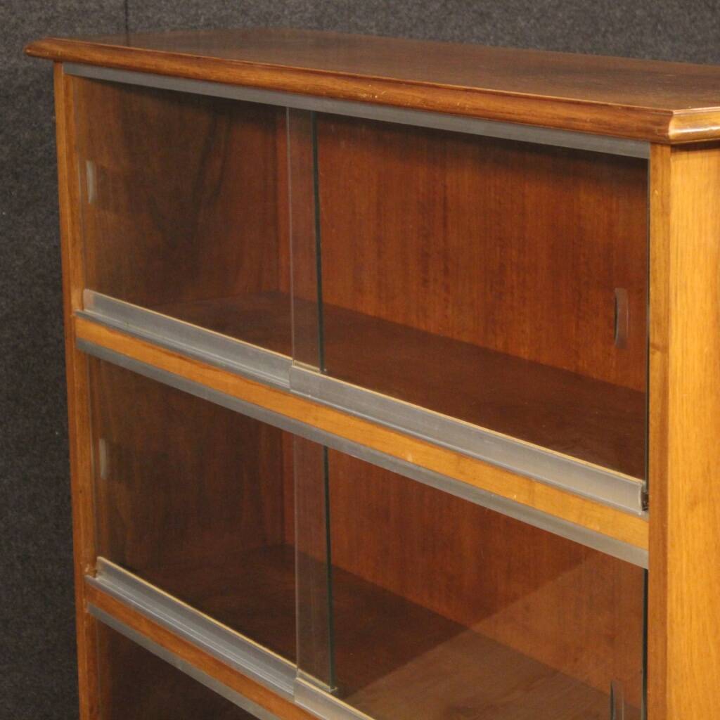 Pair of Italian bookcases in walnut wood with glass doors