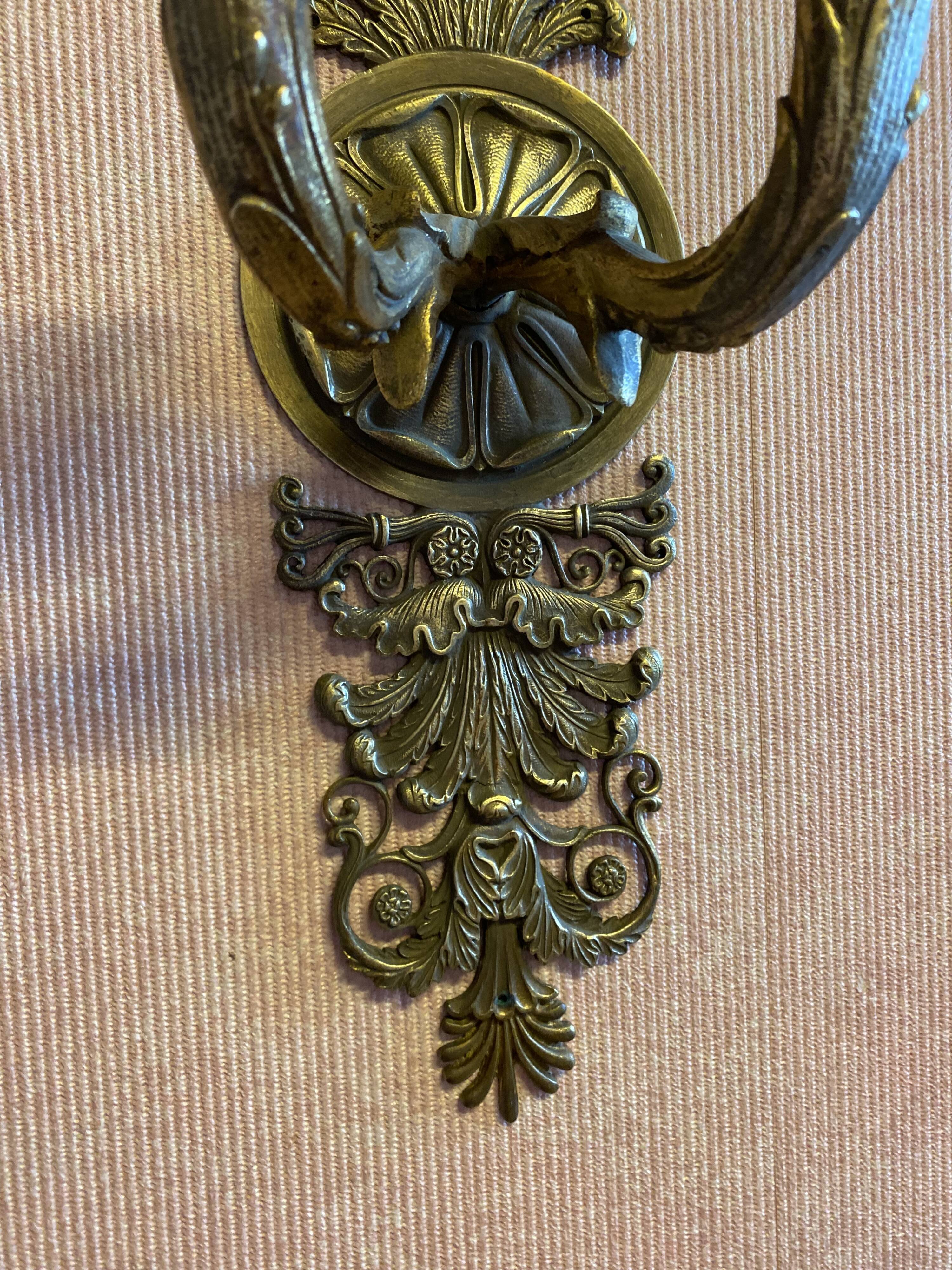 Pair of gilded bronze sconces, 2 burners, Restoration style.