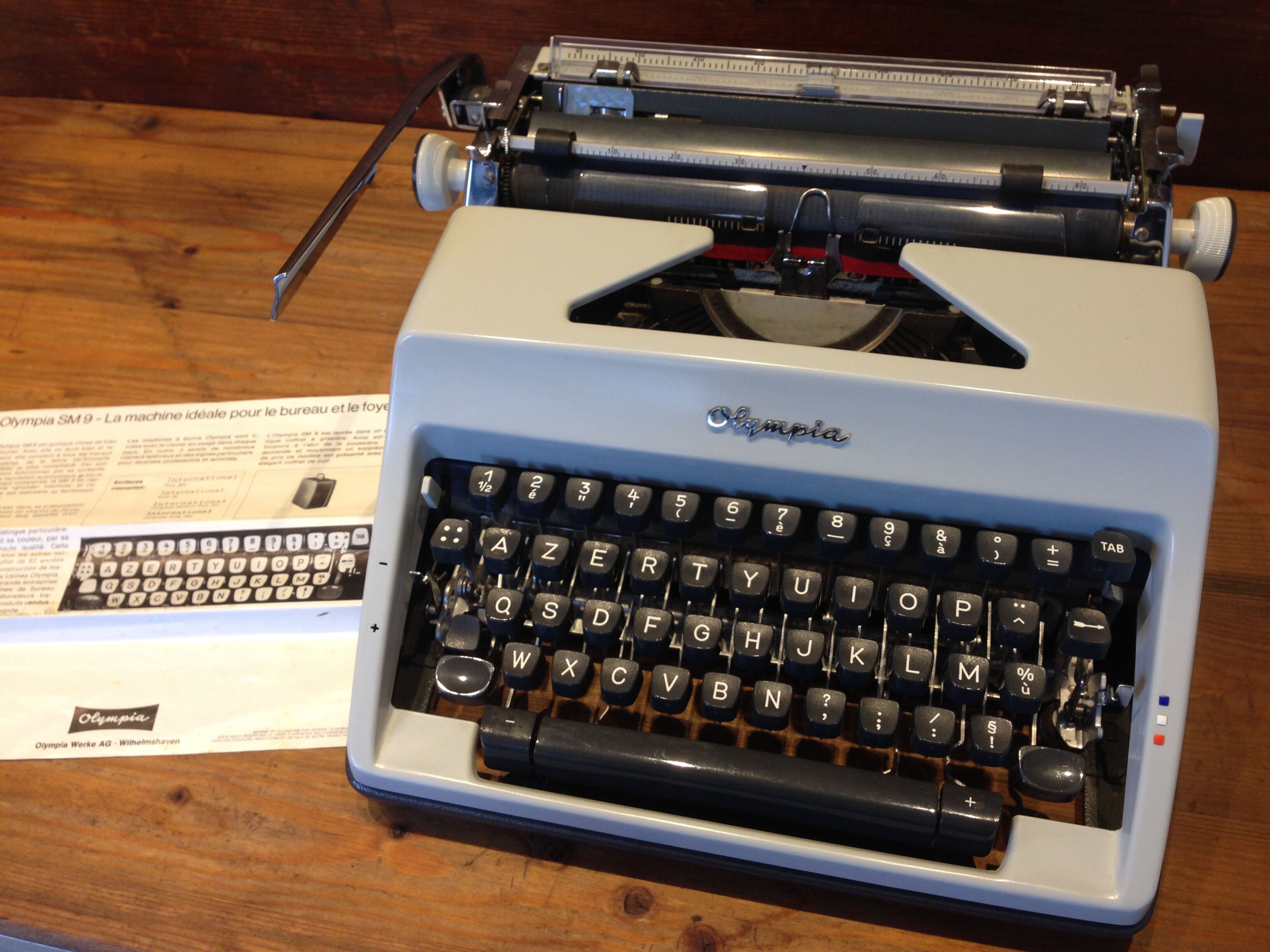 Typewriter olympia sm9 and leather briefcase