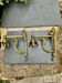 2 brass lion Empire wall sconces