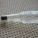 Old bottle with glass pipette