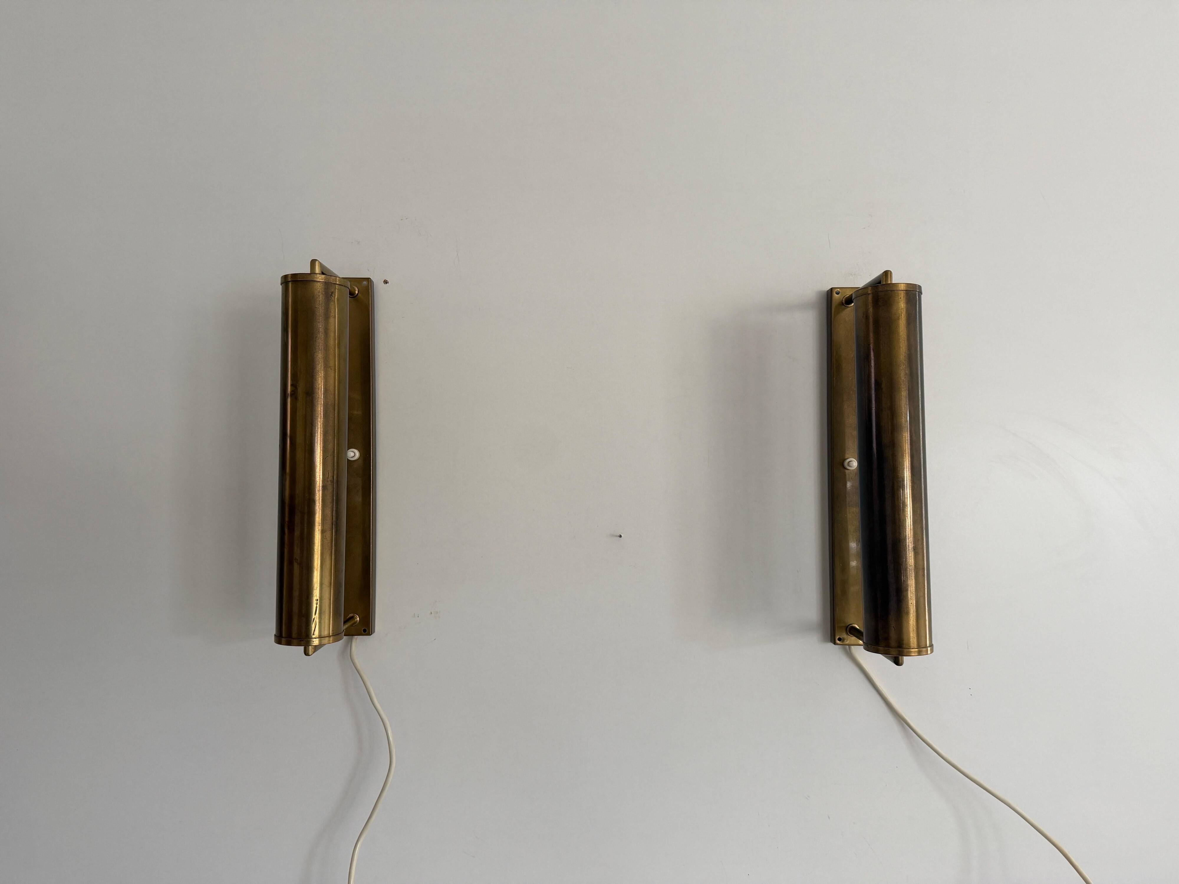 Pair of brass wall lights with adjustable heads from the mid-20th century, 1960, Germany.