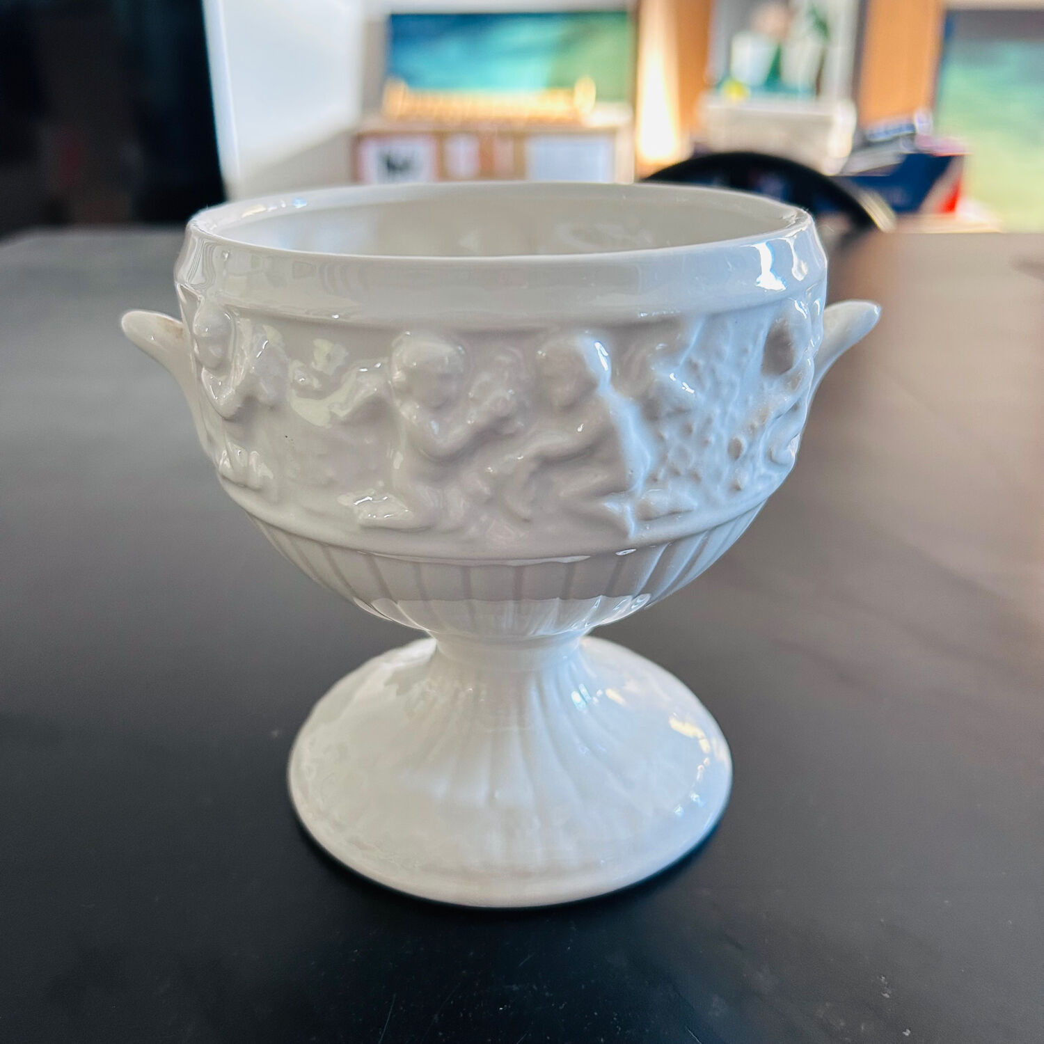 Medici-style vase decorated with cherubs