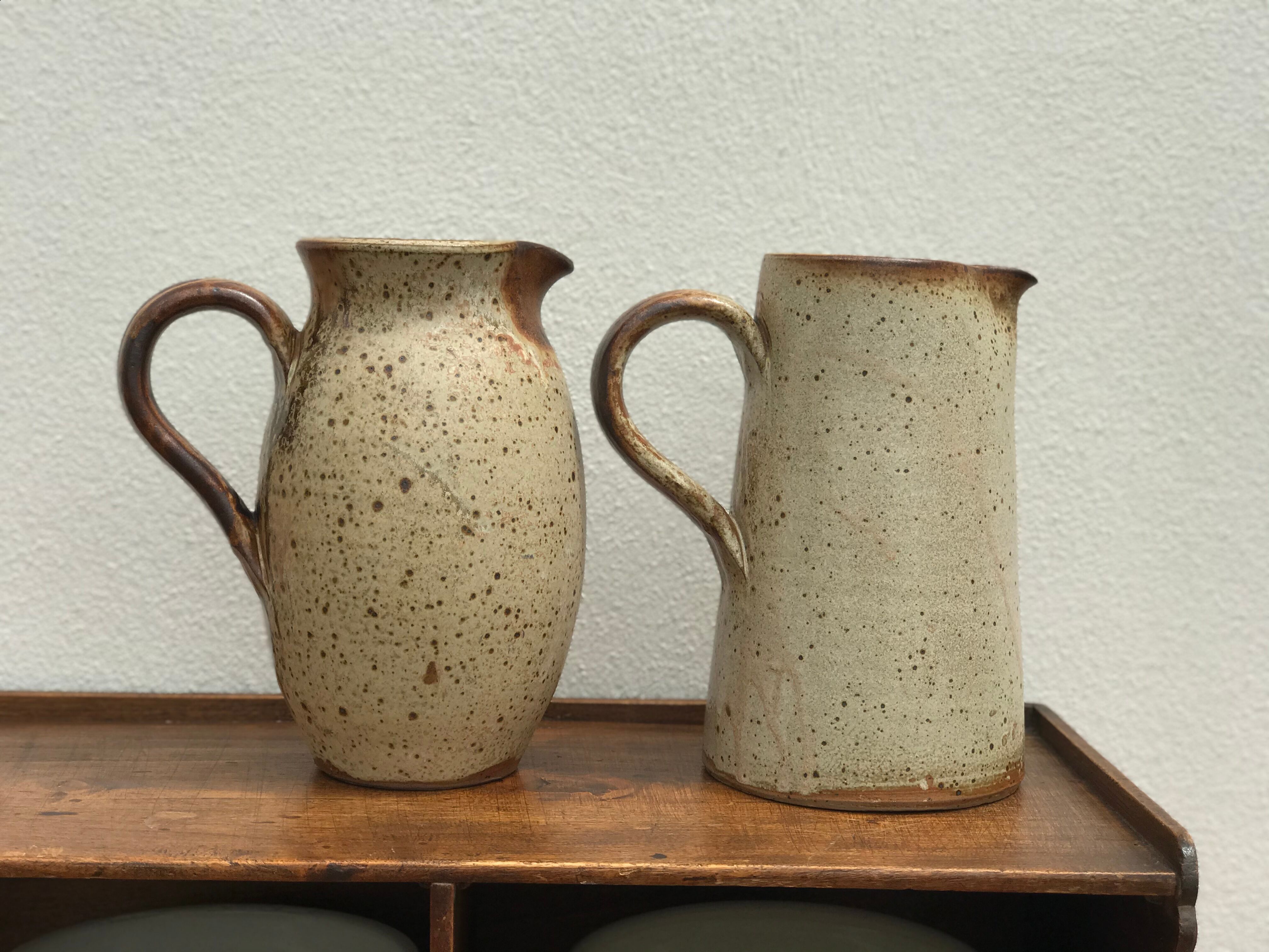Pair of sandstone pitchers