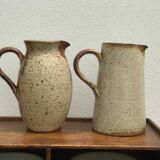 Pair of sandstone pitchers
