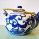 Hand-painted blue floral pattern teapot