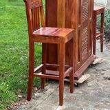 Exotic wood bar with 2 high stools.