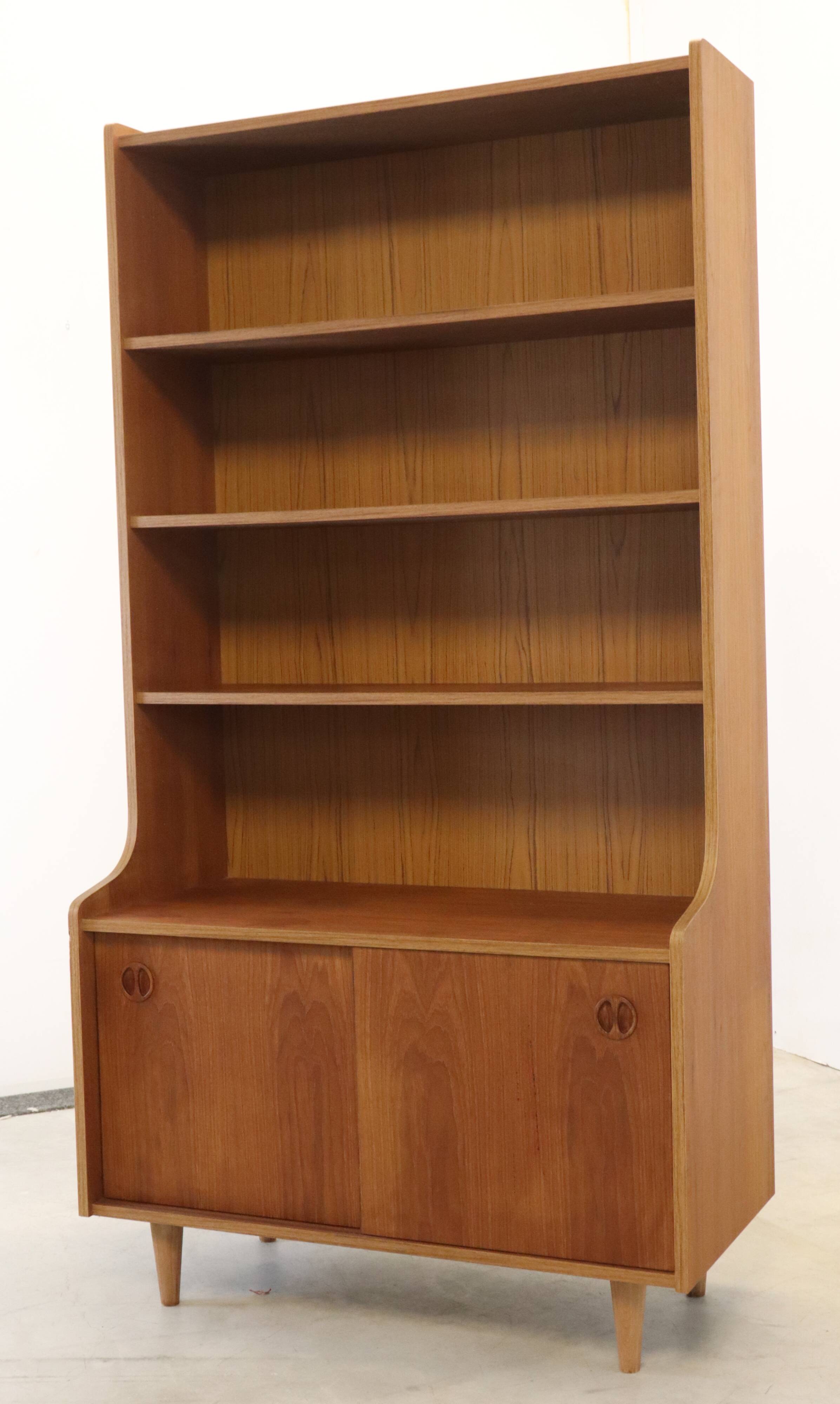 vintage bookcase with full on storage space.