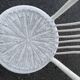 Pair of white peacock rattan chairs, circa 1960