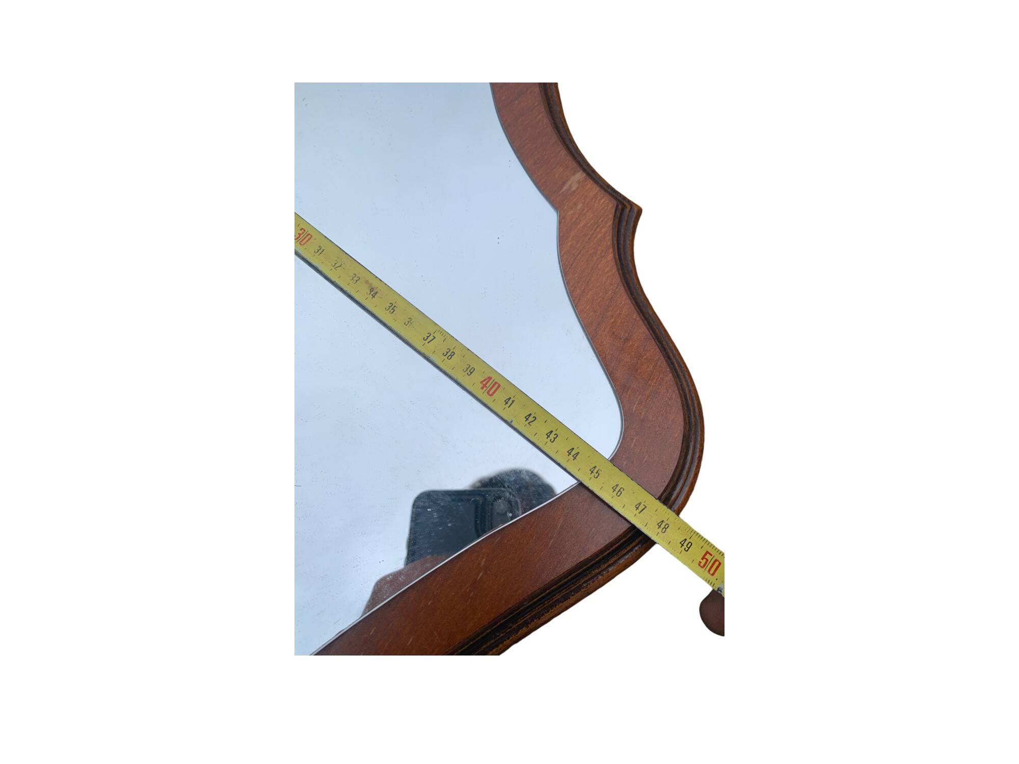 Beautiful wooden mirror with original shape