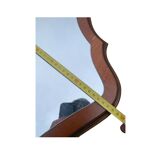 Beautiful wooden mirror with original shape