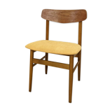 Scandinavian chair with mustard yellow fabric