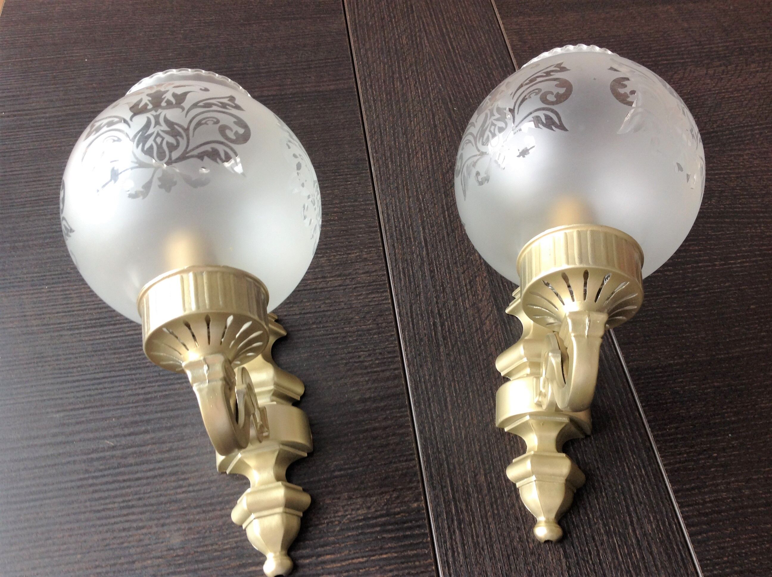 Pair of wall lamps in gilded metal and frosted glass art deco style