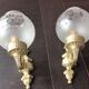 Pair of wall lamps in gilded metal and frosted glass art deco style