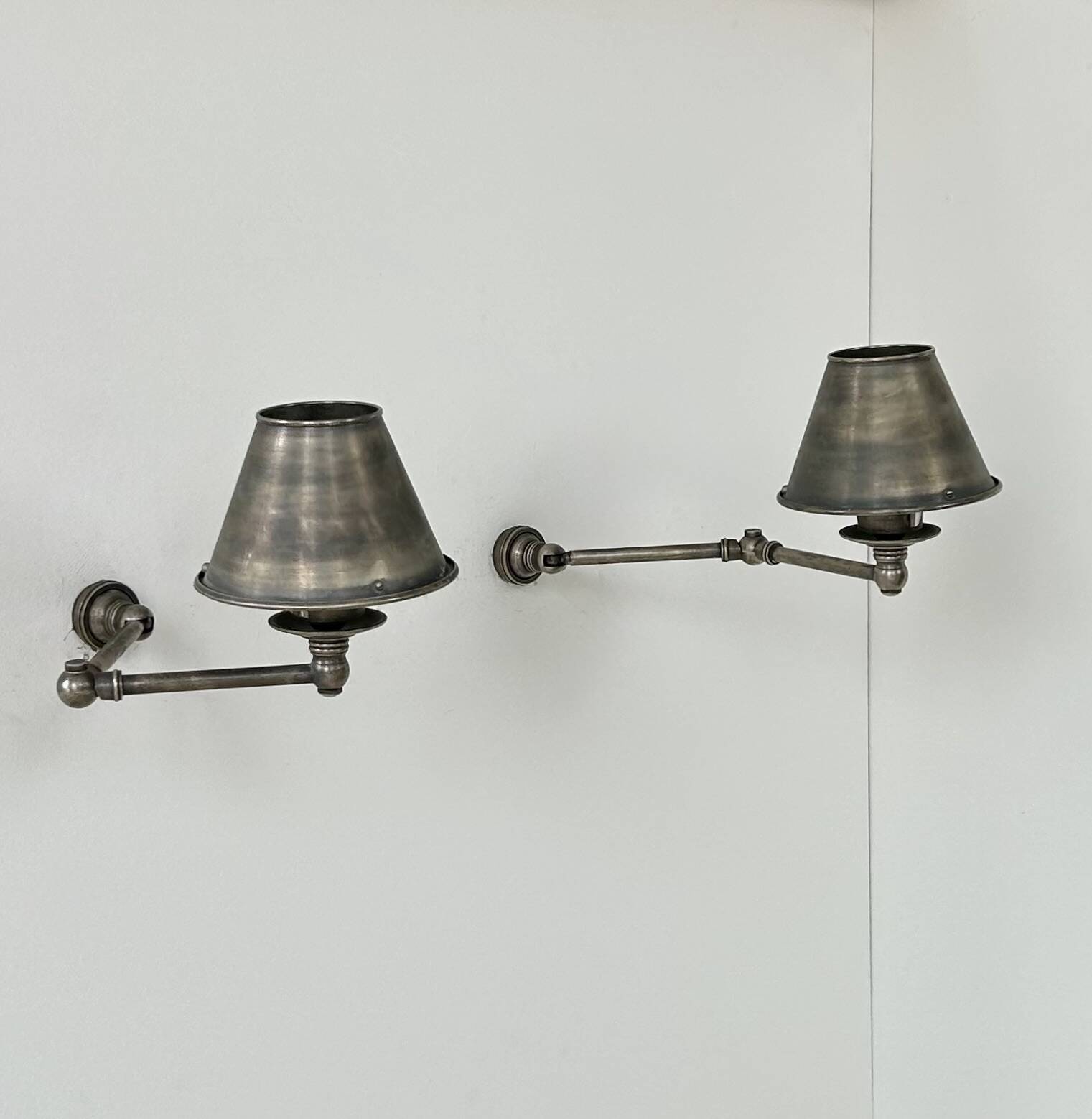 Pairs of adjustable vintage wall lights in steel, France, 1970.