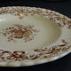 6 hollow earthenware plates Terre de fer, model Ribbons from Longchamp