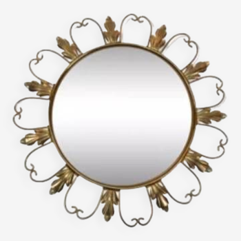 50s “witch’s eye” sun mirror. deknudt hollywood regency