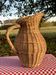 Large vintage wicker jug