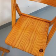 Pair of vintage folding chairs in pine from the 70s and 80s.