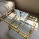 Vintage 1970s coffee table brass chrome Maison Jansen style with a top cover.